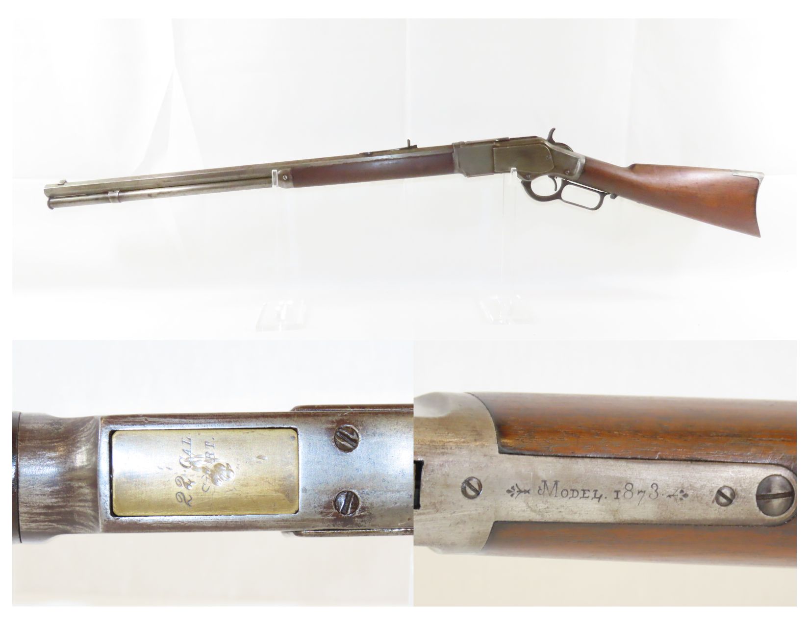 https://www.ancestryguns.com/wp-content/uploads/2023/05/Winchester-Model-1873-Lever-Action-Rifle-in-.22-Rimfire-Short-4.4-CRAntique001.jpg